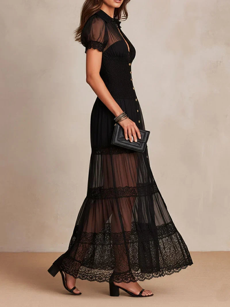 Schwarzes, figurbetontes Maxikleid mit kurzem Ärmel und Beinschlitz