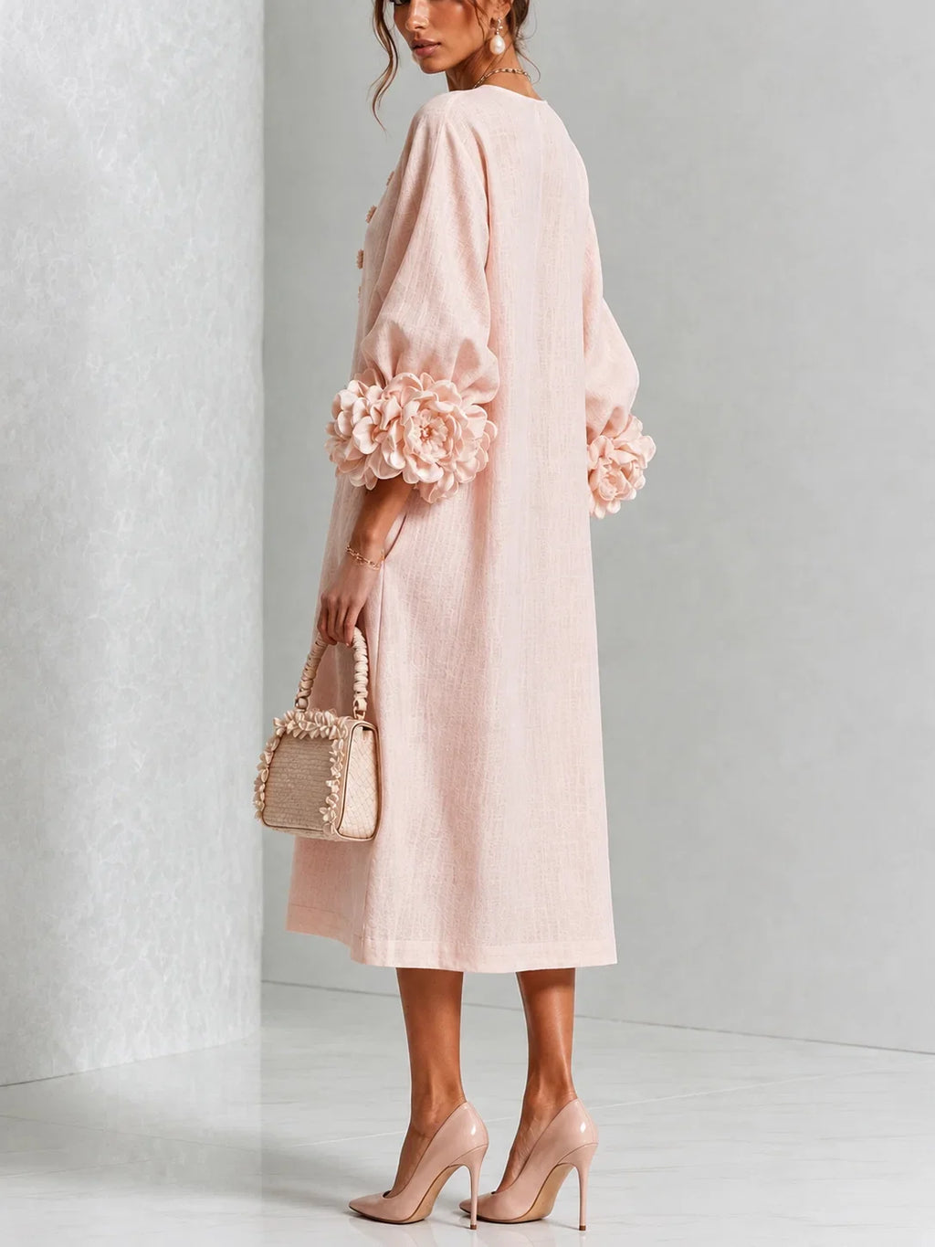 Ladina - Blumiges Midi-Kleid mit Knopfleiste und auffälligen Blumenmanschetten