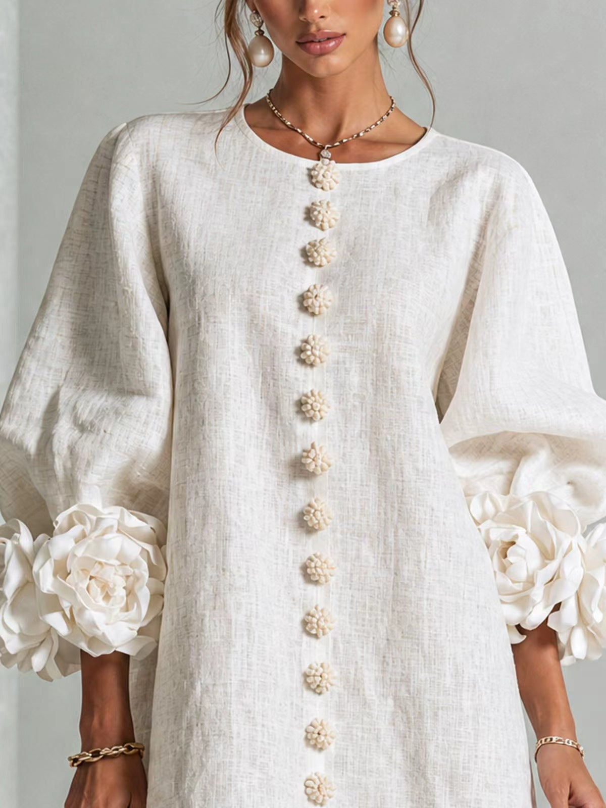 Geblümtes Kleid mit Laternenärmeln und Rundhalsausschnitt